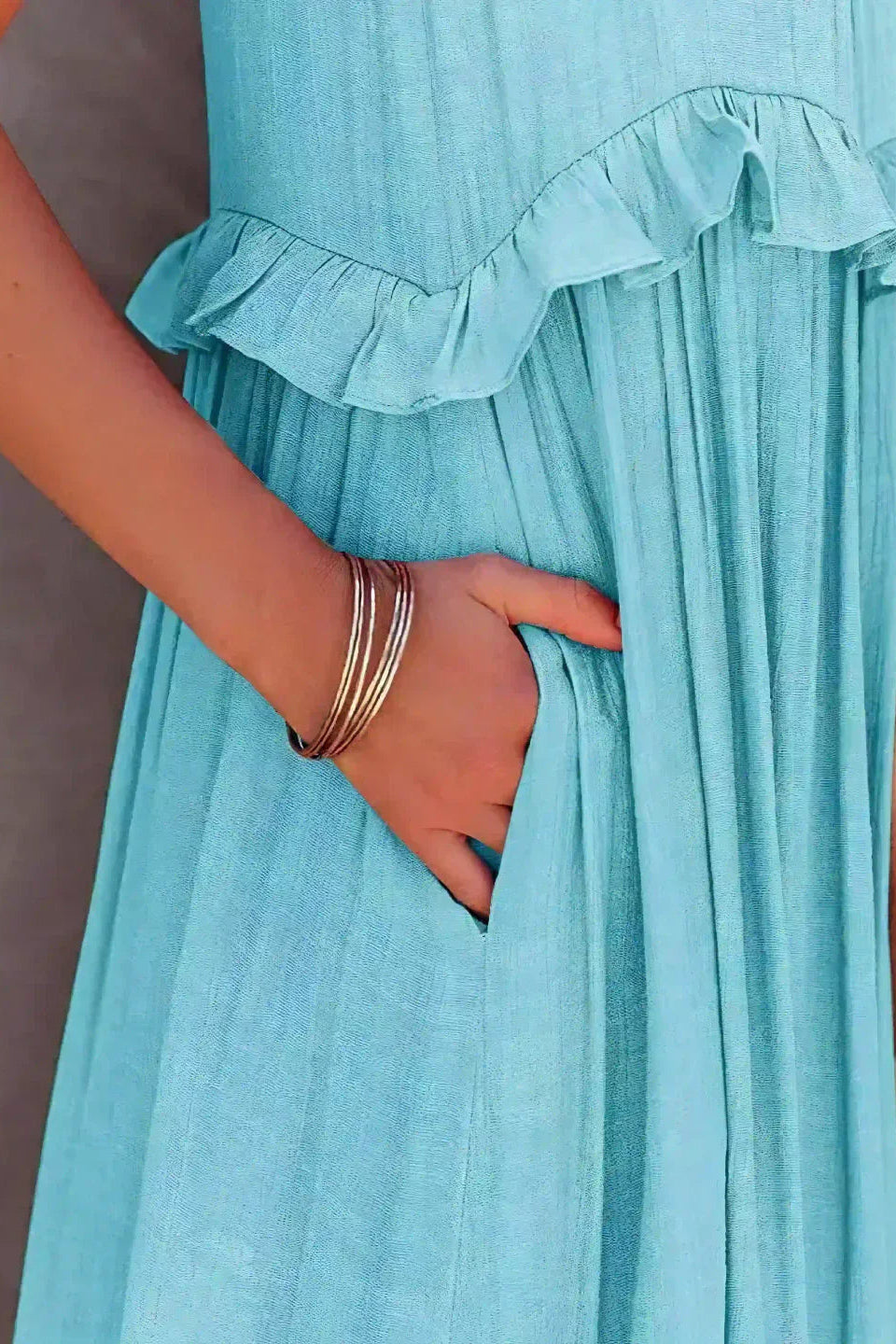 Elegant Sleeveless Ruffle Maxi Dress with Flattering Drape