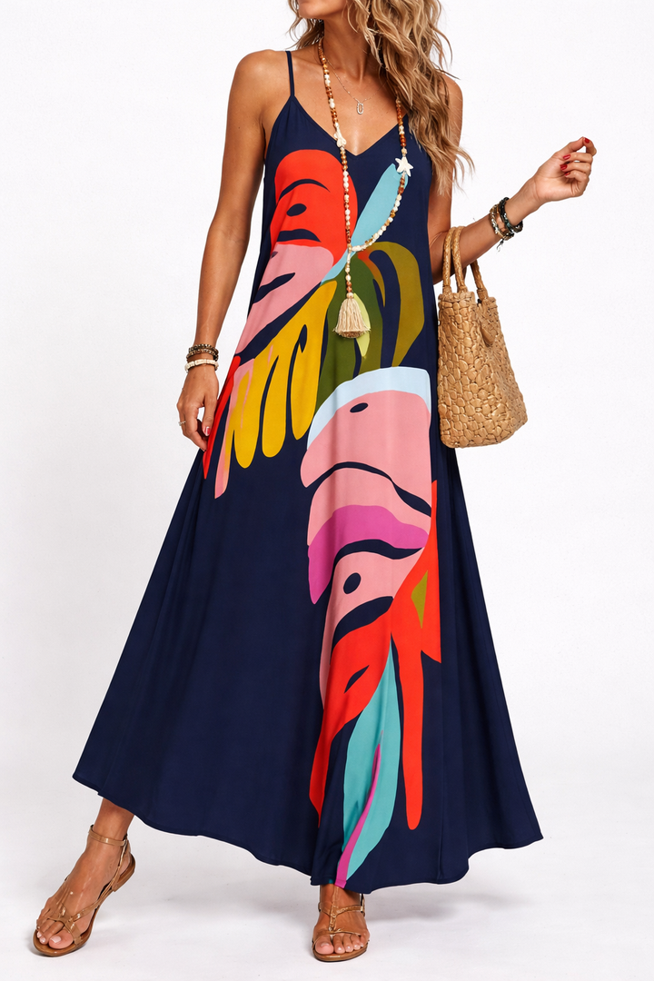 Vibrant Leaf Print Maxi Dress with Flowing Skirt